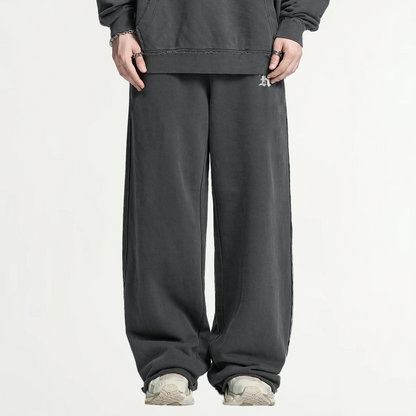 SNOW_EROSION // RAW-EDGE SWEATPANTS